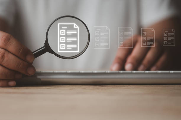 istock Businessman use a magnifying glass check document. Audit Document concept, quality assessment management. 1771007395