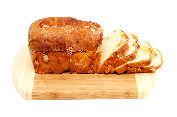 istock baked sugar bread in closeup on wooden cutting board 177101299