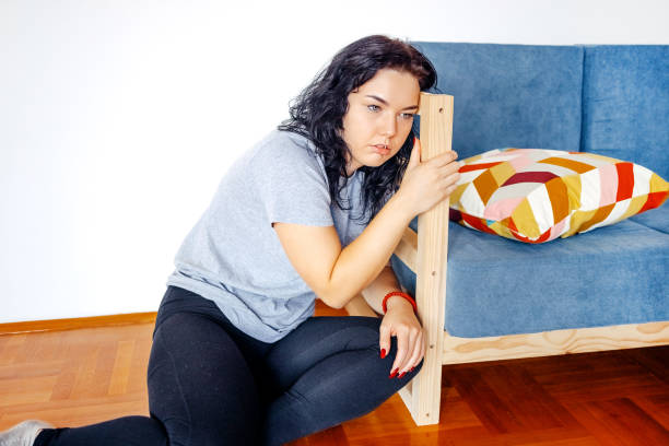 istock Young sad and depressed woman home alone 1771017550