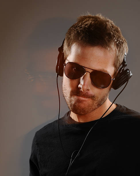 istock Moving DJ with headphones 177102233