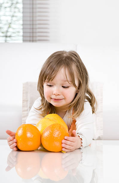istock little girl with fruits 177102892