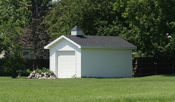 Three new garages in a uk housing development