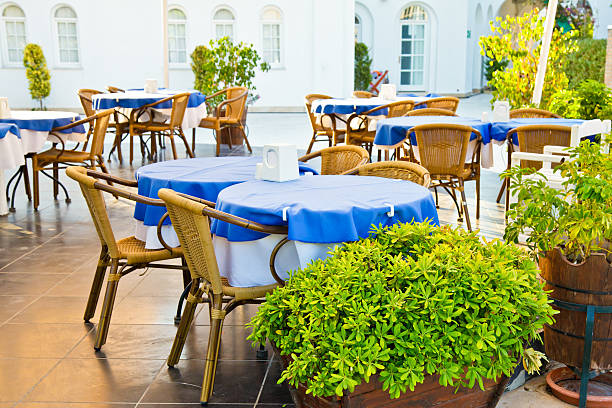 istock Tables and chairs in outdoor restaurant 177103047