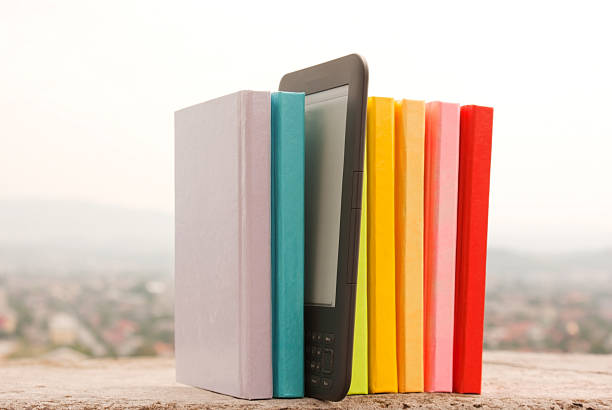 istock Row of colorful books with electronic book reader 177103194