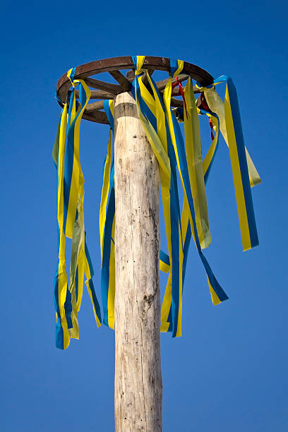 istock wheel with colored ribbons on a background of blue sky 177104525