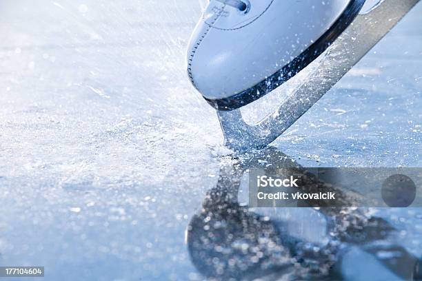 Woman Skates Braking Ice Frazil Flying Around Stock Photo - Download Image Now - Ice-skating, Ice, Close-up