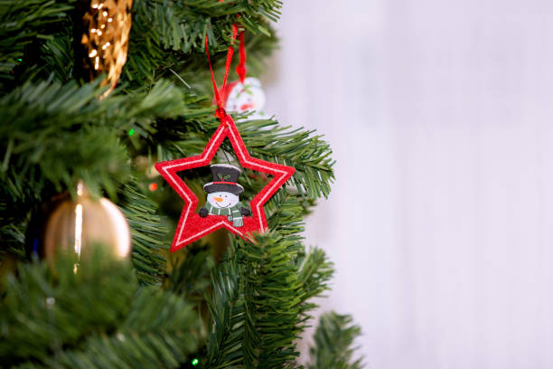 istock Christmas star on the xmas tree background 1771049114