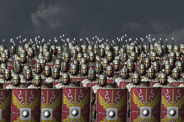 Roman army Face to face with a roman legion just before the battle begins. roman stock pictures, royalty-free photos & images