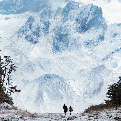 two people walking to martial glacier in ushuaia, argentina