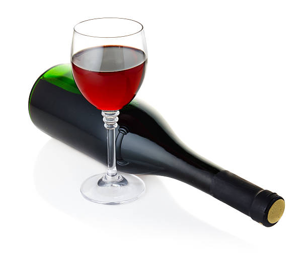 istock Bottle and goblet of red wine isolated on white 177104995