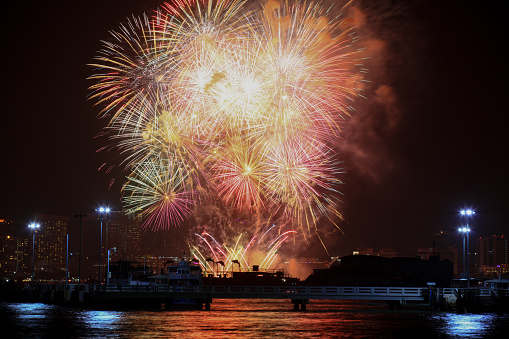 Beautiful colorful firework texture background, Low Angle View Of Firework Display Over Sea At Night