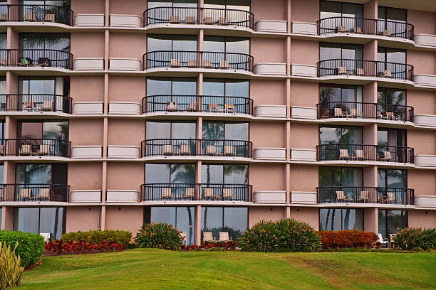 istock palm trees in front of a tropical hotel on Maui 177105602