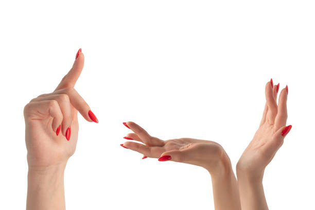 istock Woman hand with red nails holding something. 1771060307