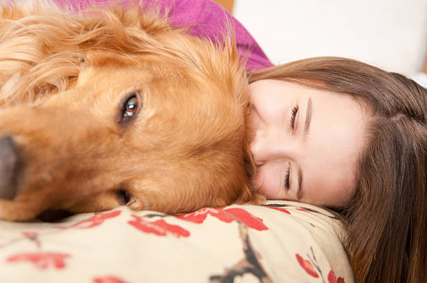 Happy Girl Laying With Her Dog