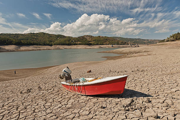 istock dry lake with a little boat 177106841