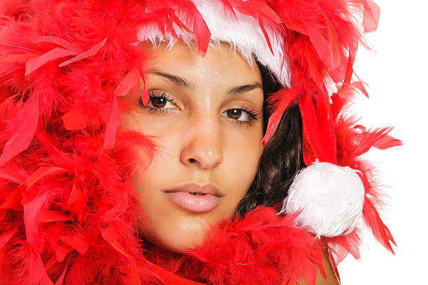 santa femme proche portrait - feather boa feather isolated red photos et images de collection