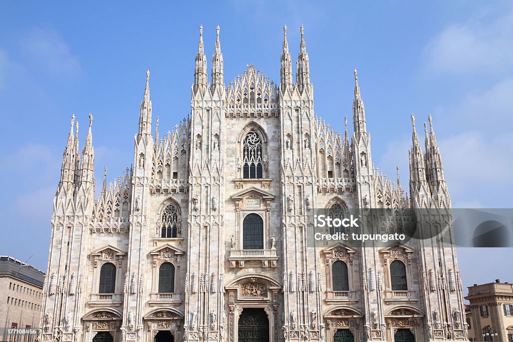 Milan cathedral "Milan, Italy. Famous landmark - the cathedral made of Candoglia marble." Architecture Stock Photo