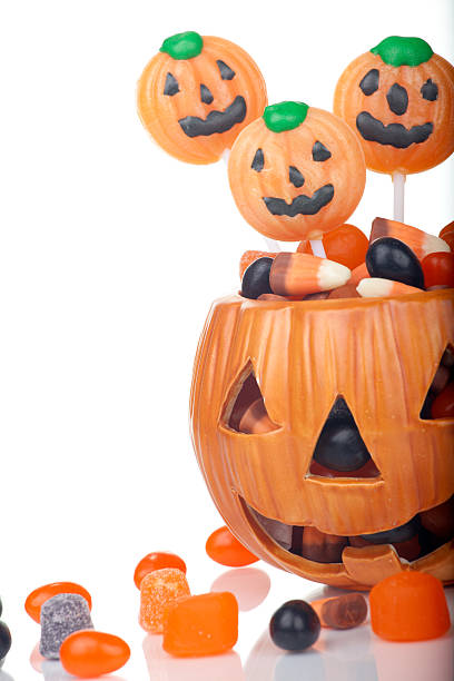 istock Halloween candy in pumpkin bowl 177108476
