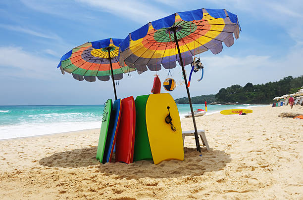 Beach with bodyboards Beautiful beach landscape with bodyboards in Thailand body board stock pictures, royalty-free photos & images