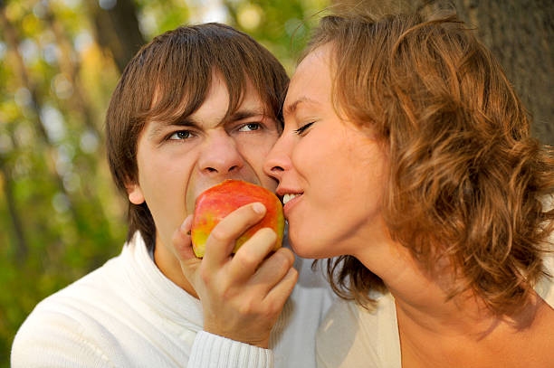 istock Loving couple eating apple 177110116