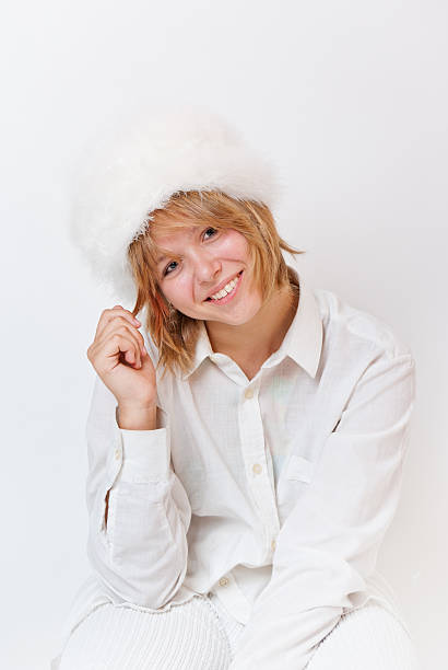 Girl in white smiling overwhite stock photo