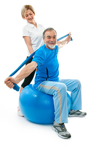 istock A senior man on a ball being trained 177111916