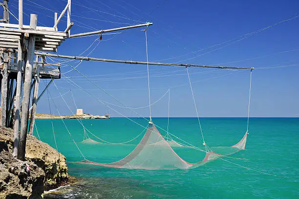 Trabucco is an old fishing machine typical of the coast of Gargano in the Apulia region of southeast Italy. It is protected as historical monument.