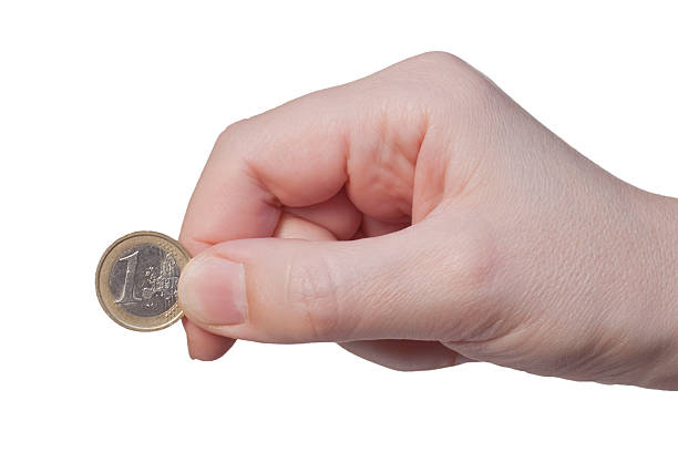 istock Hand holds the coin 1 euros 177112303