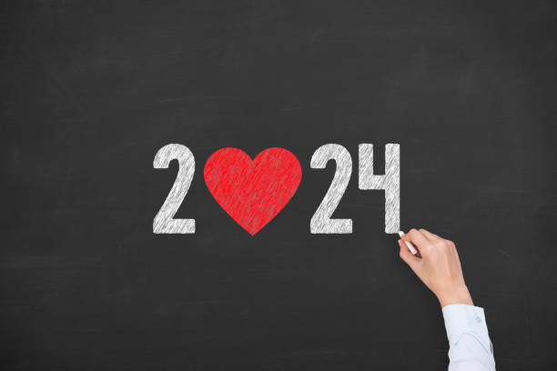 istock New Year 2024 with Heart Shape on Chalkboard Background 1771125404
