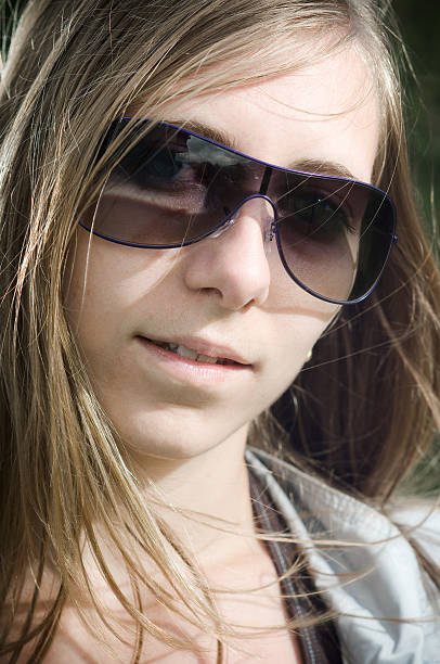 istock woman with sunglasses 177112651