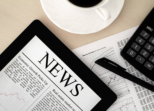 istock Tablet PC With News On Desk 177112964