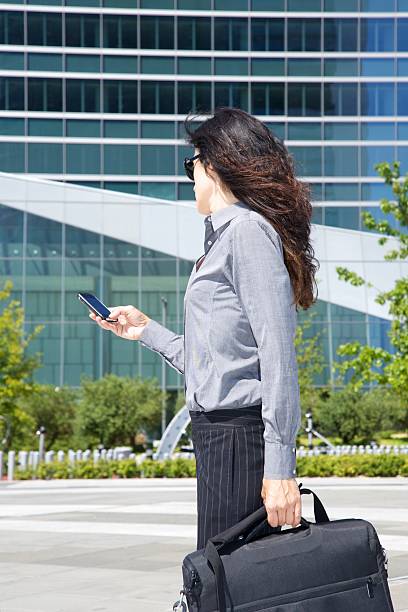 istock business corporate woman calling browsing mobile smart phone on hand 177112982