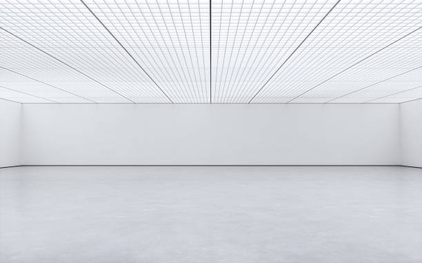 Front view of an empty, unfurnished white large gallery/showroom interior with ceiling industrial construction