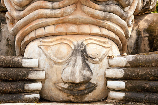 strange spiritual face scultpture, wat khaek, nong khai, thailand