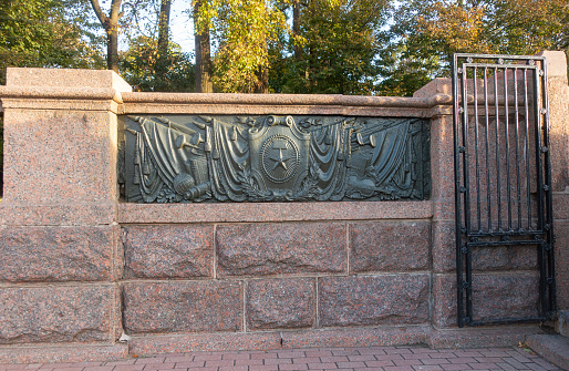 Fragment of the government tribune of the Soviet period on Oktyabrskaya Square in Minsk. Bas-relief on the theme of education and culture