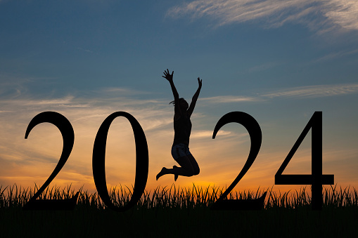 Woman enjoying and 2024 years while celebrating new year