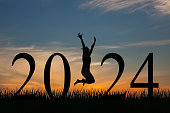 Woman enjoying and 2024 years while celebrating new year