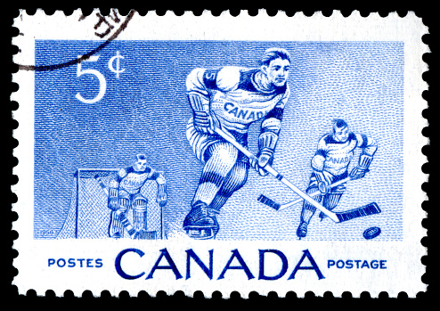 Canada postage stamp showing ice hockey players