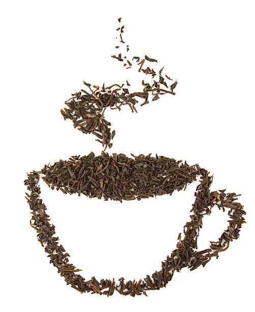 aromatic cup of tea made of black dry tealeafs