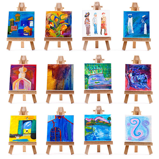 Twelve mini paintings on easels stock photo