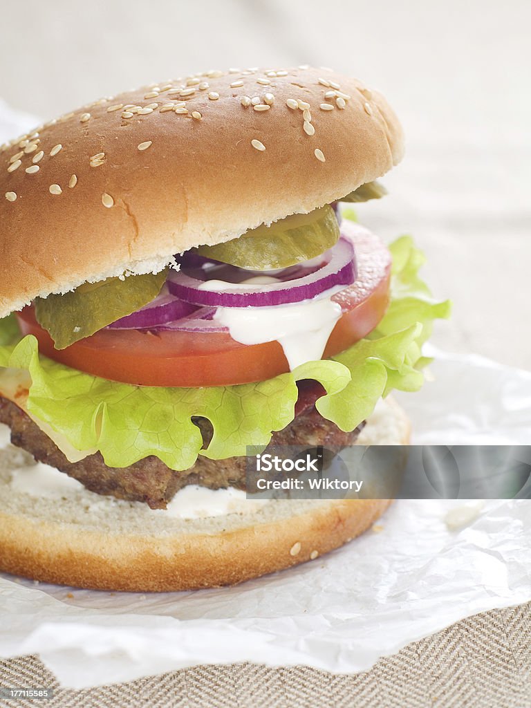 hamburger "Hamburger with cheese, meat and fresh vegetables, selective focus" Bread Stock Photo