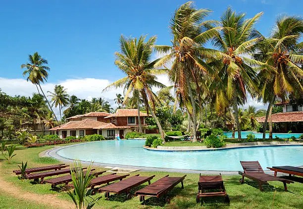 Photo of Swimming pool near villas at popular hotel, Bentota, Sri Lanka