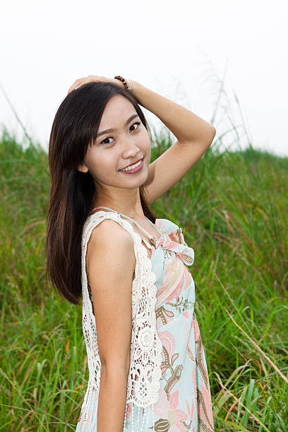 istock Young beautiful Asian woman looking at camera 177116424