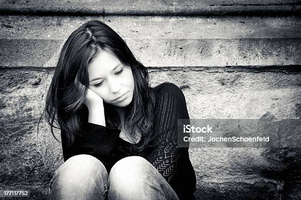 Teenage Girl Looking Thoughtful About Troubles Stock Photo - Download Image Now - 18-19 Years, Adult, Beautiful People