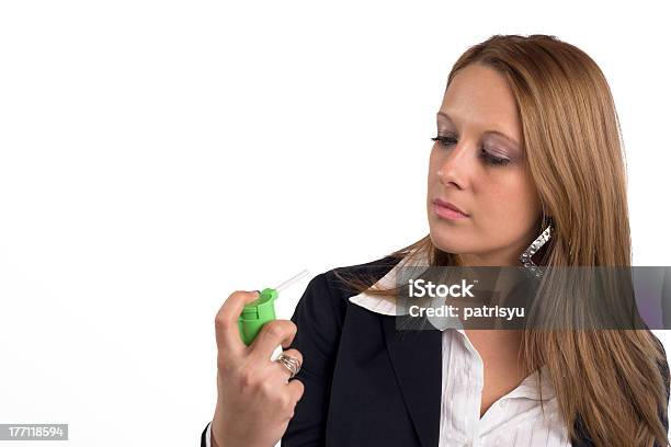 Businesswoman With Asthma Using Inhaler Stock Photo - Download Image Now - Adult, Assistance, Asthma Inhaler