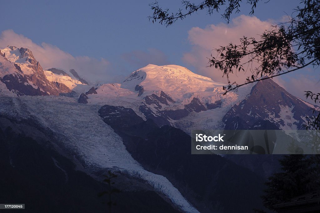 Mont Blanc at Dusk "The sun sets on Mont Blanc inthe French Alps.  Photo taken from Chamonix, France" Chamonix Stock Photo