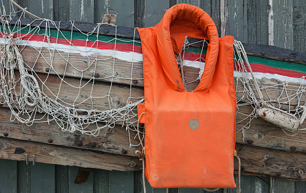 casaco velho - life jacket isolated red safety imagens e fotografias de stock