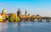 Prague cityscape and Charles bridge over Vltava river, Czech Republic