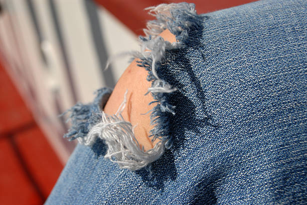 Cтоковое фото Дыра В джинсы