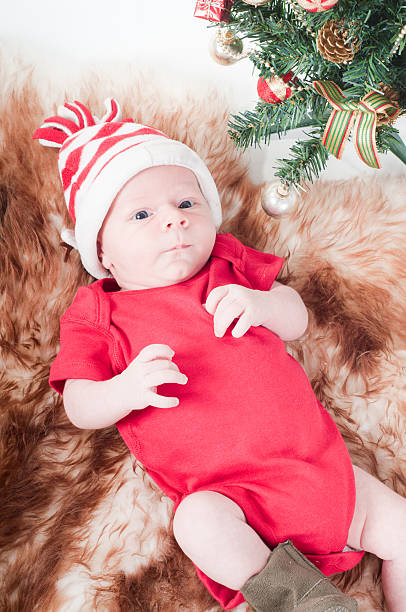 istock Newborn baby in chritstmas hat 177121318